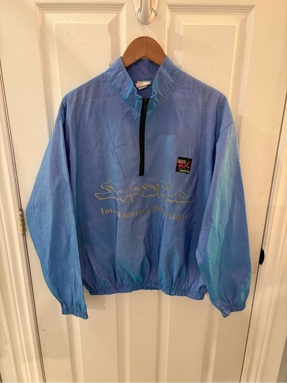 Iredescent Surf Windbreaker Pullover in Light Blue with Teal Accents